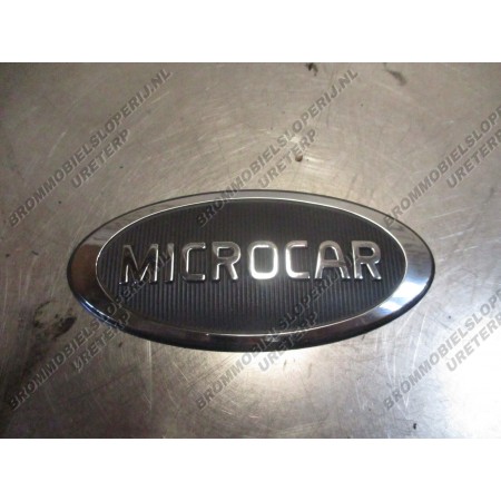 Logo embleem ovaal Microcar M.G0 ( zwart en chroom)